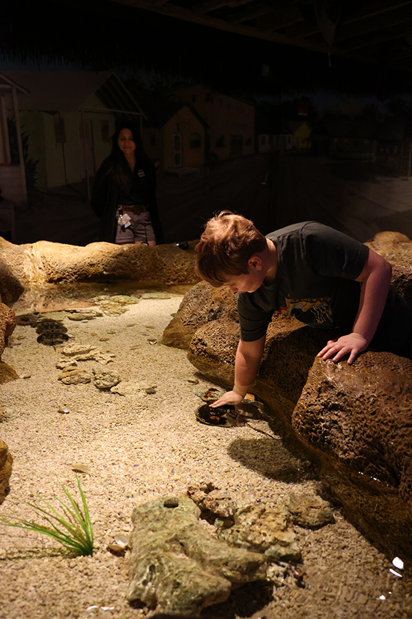A guest experiences the Invert Touch exhibit.